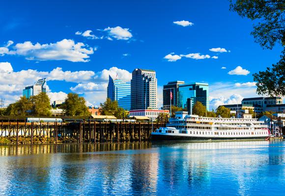 Downtown Sacramento, CA skyline with the historic riverboat